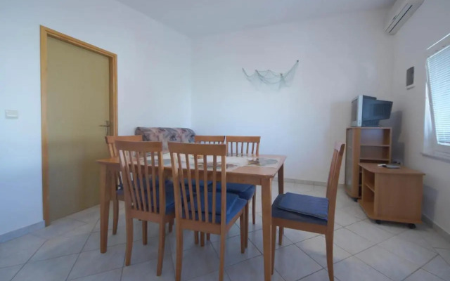 Apartments by the sea Vir - 18140
