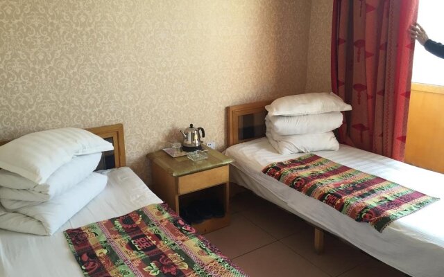 Baotou Qimao Inn