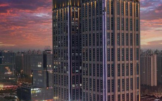 Xinzheng Xingangwanhua Hotel