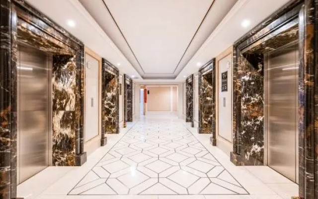Ganghui Four Seasons Hotel Apartment (Dalian Railway Station Zhongshan Square)