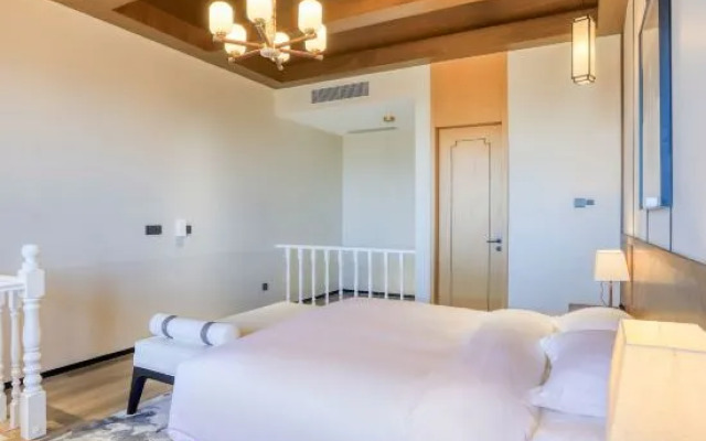 Qingdao Yixing Fang Hua Jian Tang · Lan She