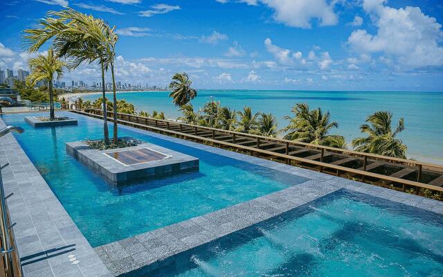 Unity #420 - Apartamento beira mar por Carpediem