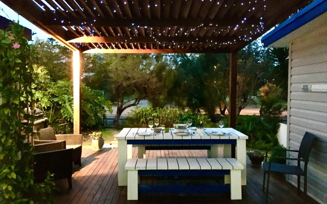 Shellharbour Beach Cottage - walk onto Patrolled beach with flags in summer