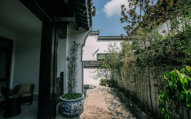 Xinhualian Lv Xin Gu Hotel