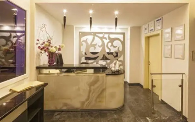 Hotel First