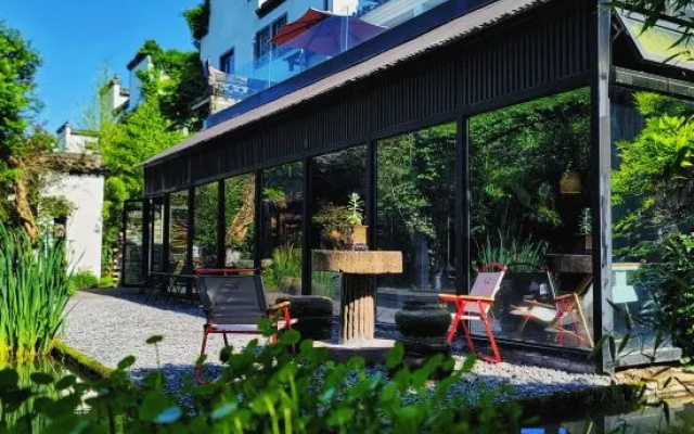 Grand Travel Lodge DESIGN Boutique Hotel(Xixi Nangu Village)