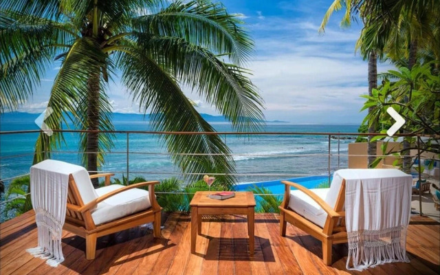 Exciting six Bedroom Oceanfront 75 Long Pool Villa