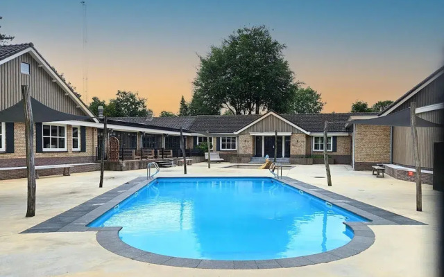 Chalet Kieftveen With hot tub for Four Person