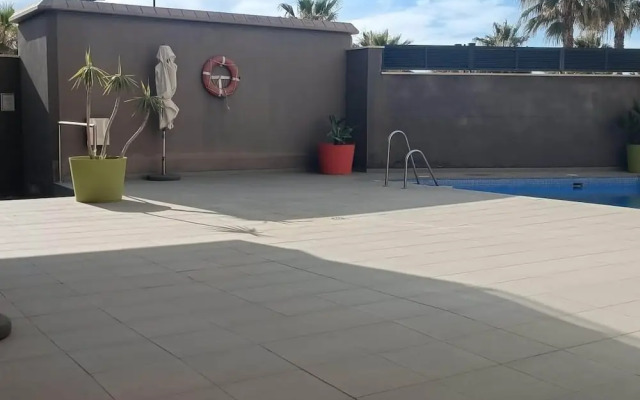 Belvilla by OYO Apartamento con Patio