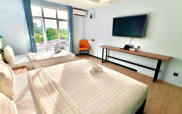 Wing Tat Grand Hotel – Guest Rooms – Semporna