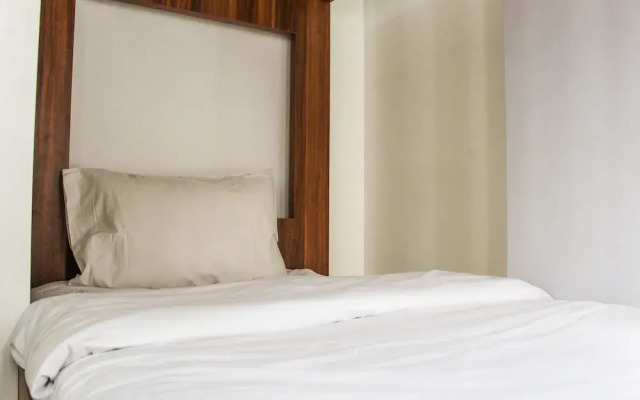 Relaxing 2BR Apartment at M-Town Residence By Travelio