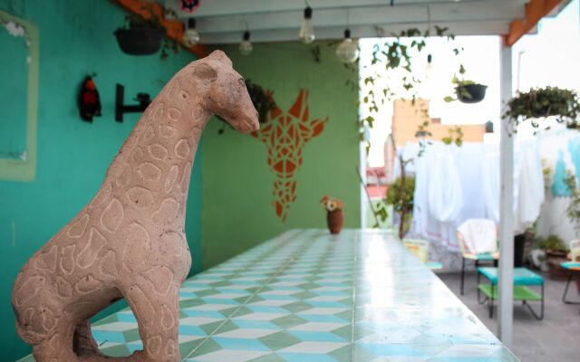 Jirafa Roja Hostel