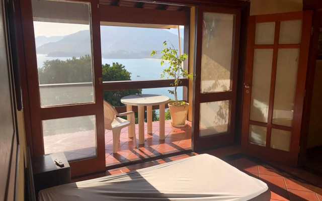 Mansão na costa com vista para o mar