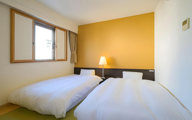 Centre One Hotel Handa – Guest Rooms – Handa