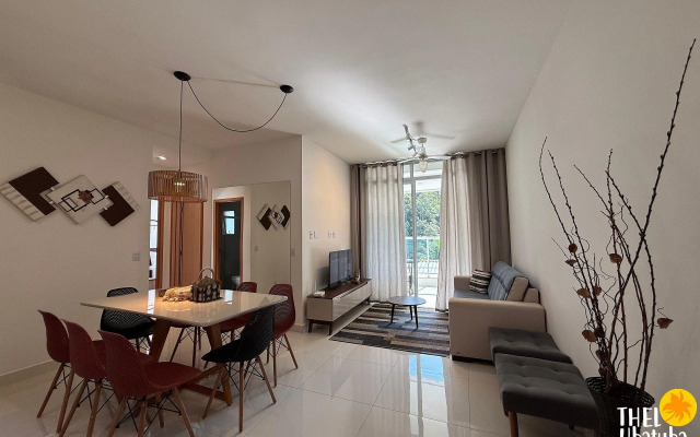 Apto completo e confortável com roupa de cama nas Toninhas  Condomínio Lumière