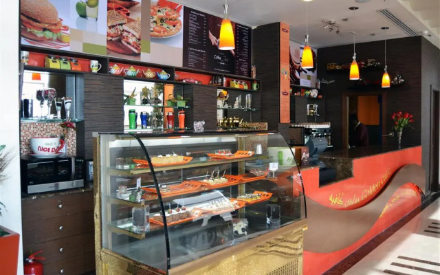 Golden Tulip Suites Breida Al Q