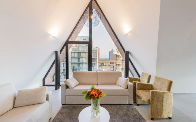 Belcasa Beach Suites & Lofts