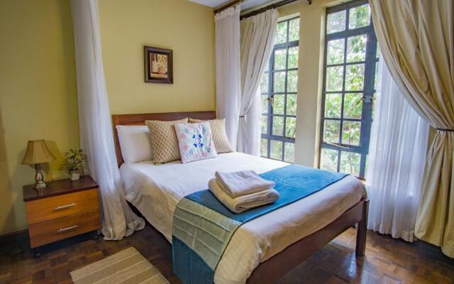 Peaceful, Spacious, Open-plan 2br apartment set in mature garden