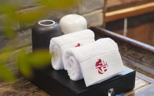 QIANNA HOTEL (Xinxiang Hualan Avenue Pangdonglai Shopping Plaza)