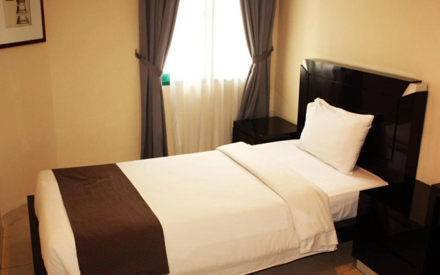 Travellers Suites Serviced Apartments