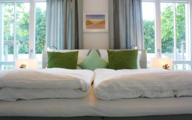 Logierhaus Friedrich -Ferienwohnung Seeblick - 1.Reihe