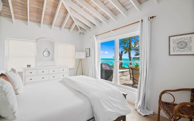 Beachfront White Palm Villa - Tar Bay
