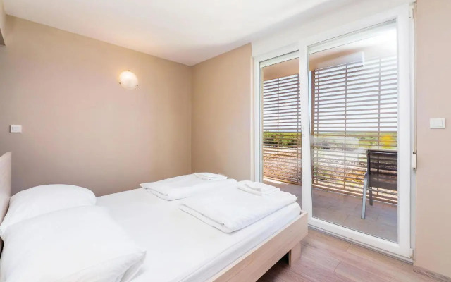 Two-Bedroom Apartment in Povljana