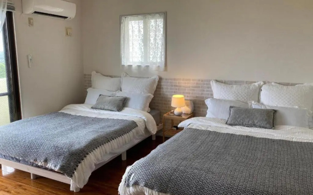 Yomitan Ocean View Apartment 201 – Guest Rooms – Yomitan