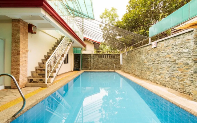 Reddoorz Premium Near Pristine Beach