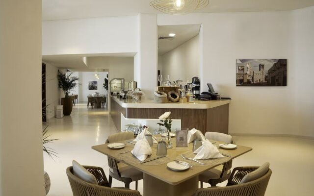 Mina Hotel and Residences By the Torch