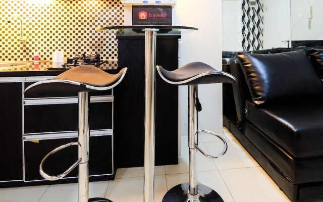 Monochrome Style 2 Bedrooms at Kalibata City Apartment By Travelio