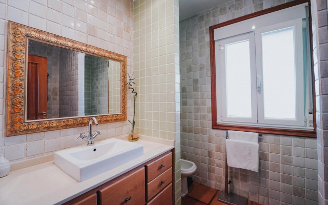 Villa con piscina a pie de playa