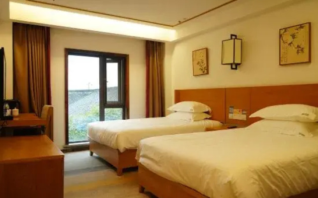 Xitang Houyuanli Hotel (Songzilai Fengqiao Branch)