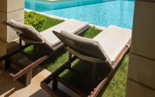 Giannoulis – Grand Bay Beach Resort - Adults Only