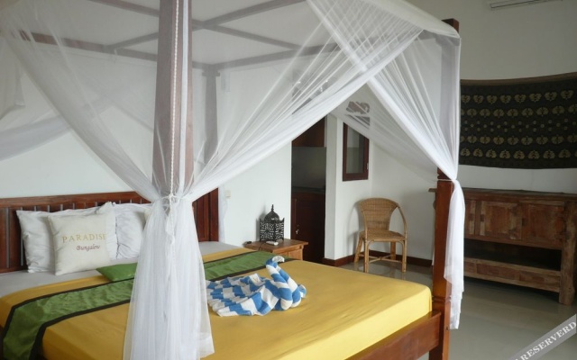 Paradise Bungalows – Guest Rooms – Bunutan