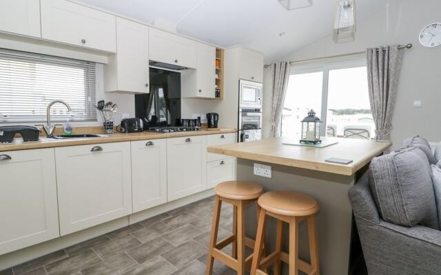 Cayton Pines Lodge at Cayton Bay Holiday Park