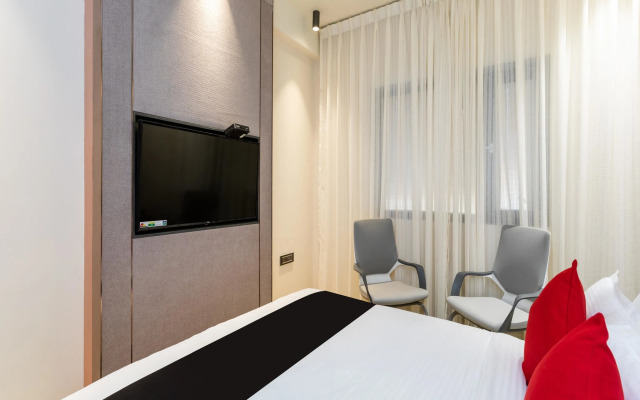 Fabhotel Prime Oasis Blue