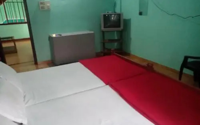 SPOT ON 68298 Prarthana Tourist Home