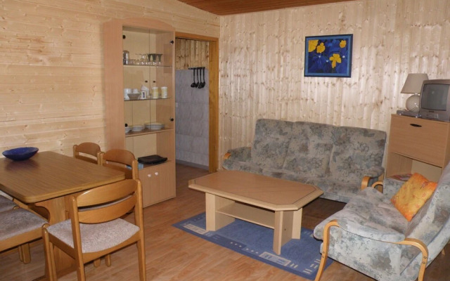 Tidy furnished wooden chalet, located close to the forest