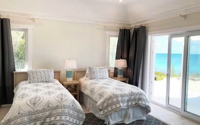 Oceanfront Elegance: New Home With Dock, Kayaks, And Pool