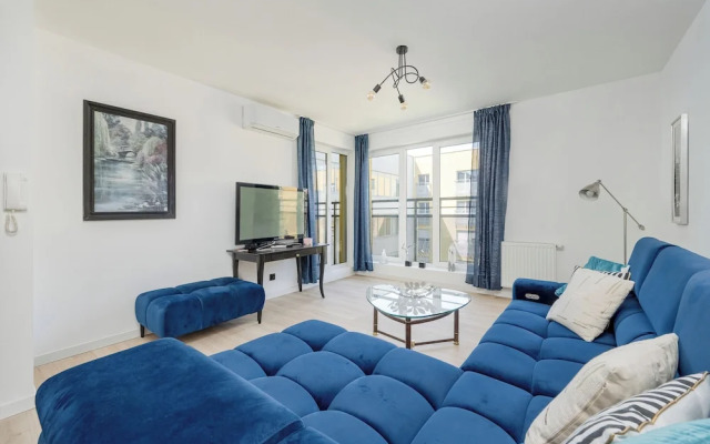 Wroclaw Dark Blue Apartment by Renters