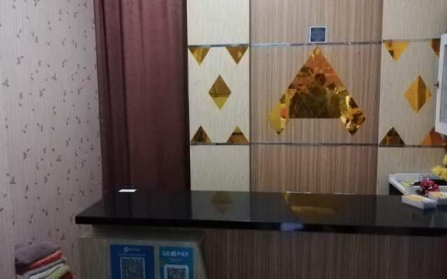 The Suites Metro Ananda Home