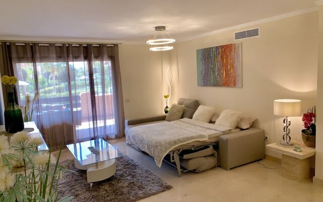 Casares Beach Golf Apartment With Private Garden and Pool Access