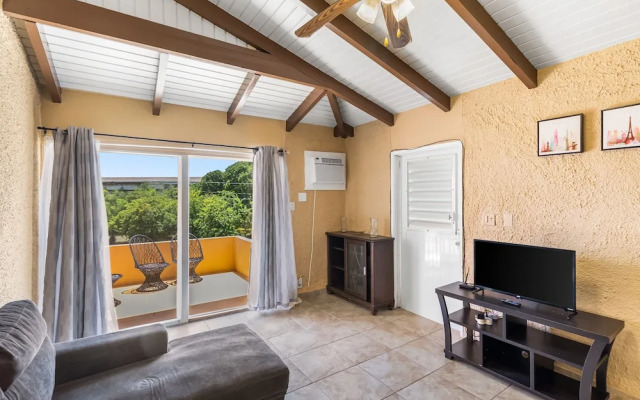 Caribbean View Style 1 Bedroom Condo by RedAwning