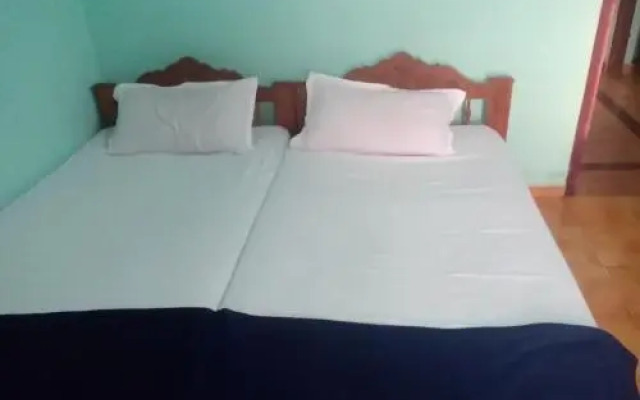 SPOT ON 68298 Prarthana Tourist Home