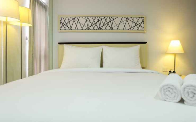 Studio Room Azalea Suites Apartment By Travelio