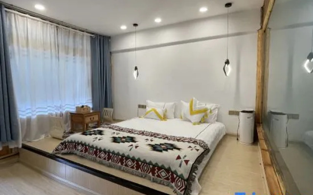 Lijiang Zhenmei Shishan Scenic Inn (Sifang Street Big Water Wheel Store)