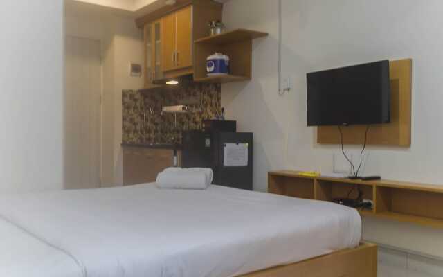 Comfy And Homey Studio Room At Grand Kamala Lagoon Apartment