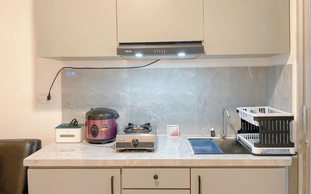 Minimalist and Cozy 1BR Green Bay Pluit Apartment