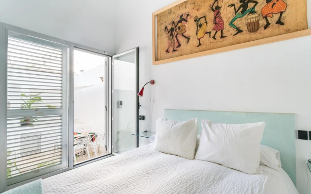 Apartamento con Patio y piscina